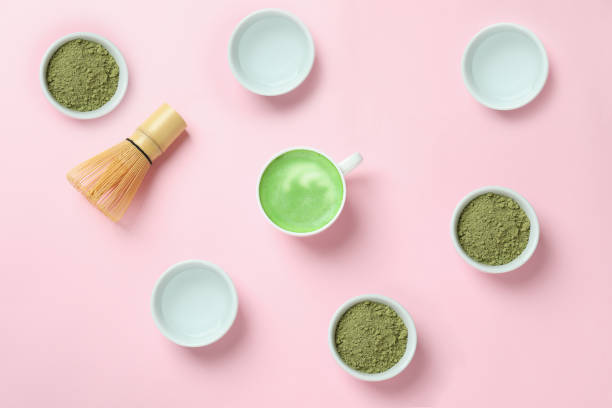 istock Matcha latte and accessories for making on pink background 1713115281
