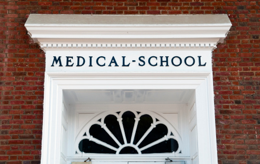 Sign above a door saying Medical School