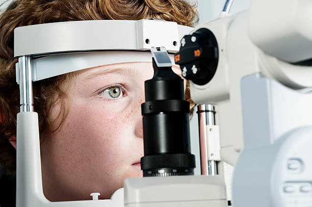 istock Young Boy Having His Eyesight Checked At The Opticians 171311946