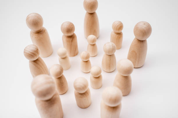 istock Figures in solitude isolated from other people, minimalist, seen from above. 1713120296