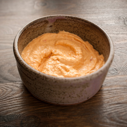 Bowl of Spicy pepper hummus.