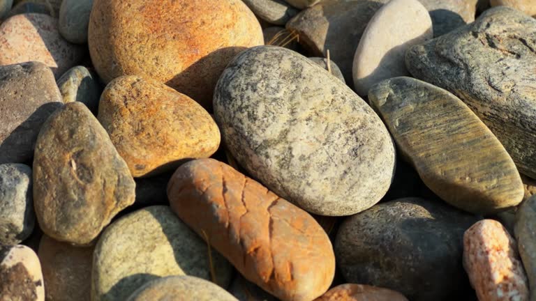 Rocky Beach Surface With Colorful Stones Shot stock video