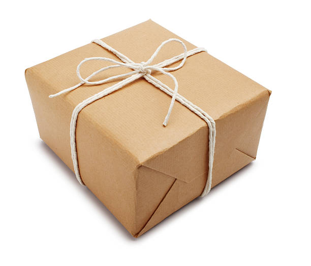 parcel - string package brown paper стоковые фото и изображения