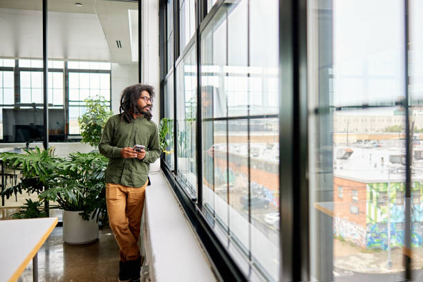 istock Contemplative businessman looking at view 1713124866