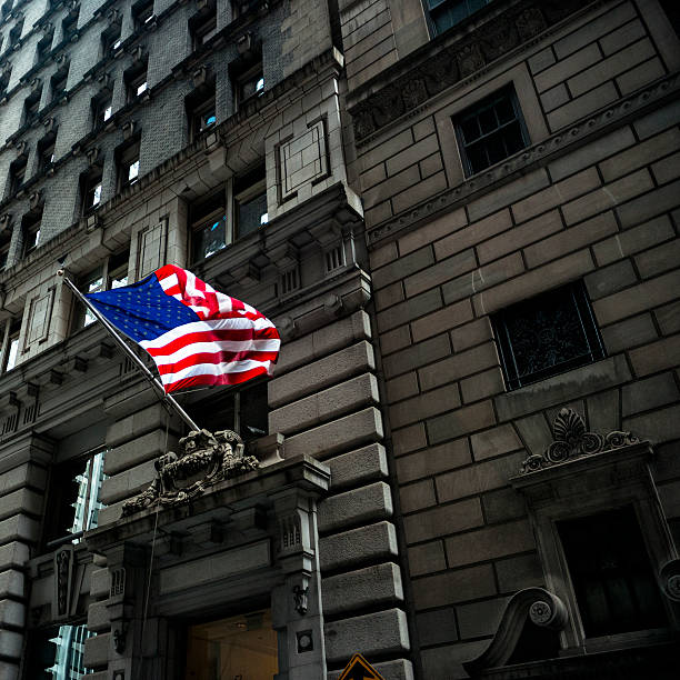 istock American flag in front of old building 171312875