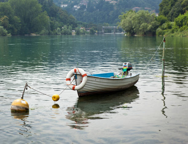 Lake landscape with boat. Lombardy Italy.