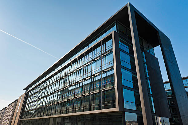cool corporate office building against blue sky - copenhagen business bildbanksfoton och bilder