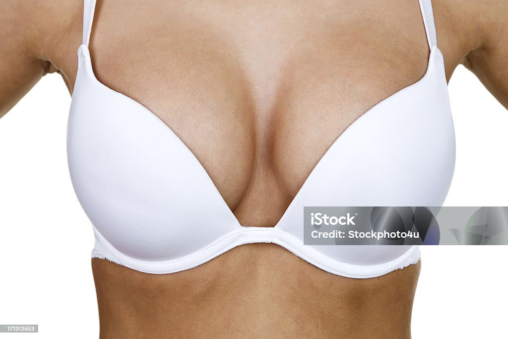 Voluptuous woman Closeup of a voluptuous woman wearing a bra for body care or beauty concept Breast Stock Photo