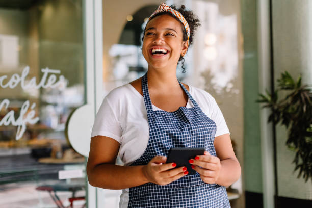 istock Successful entrepreneur in a coffee shop using a tablet pc 1713137983