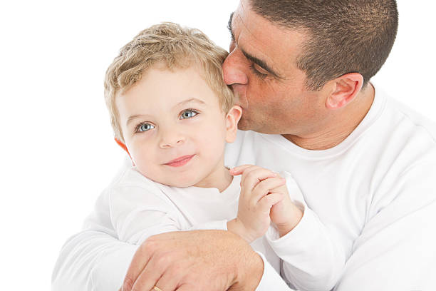 A father with adorable little son isolated on white