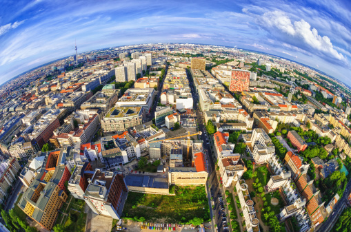 Birds eye view on Berlin taken with a fisheye lens on a beautiful clear summer day with 80 km visibility. Some grain.