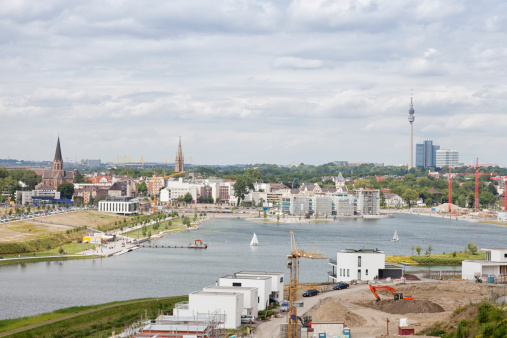 lake phoenix and Dortmund cityscape: one at this place was a huge steel plant, now substituted with n artifical lake and a place where new building are constructed