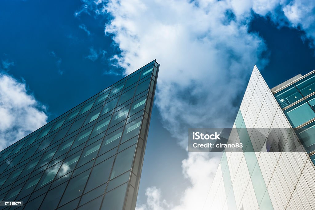 Contemporary architecture in London Contemporary architecture with clouds and reflection in London.  Abstract Stock Photo