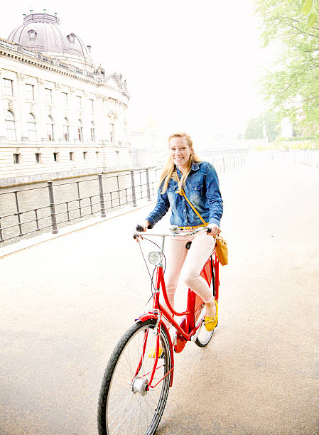 istock Woman on red bicycle berlin 171315523