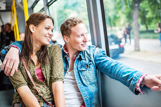 istock Young couple in a bus looking through window. 171315805