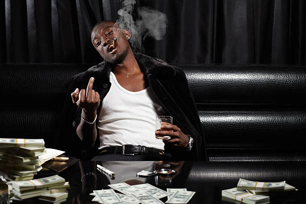 Do not give a damn Unpunished drug dealer showing obscene gesture vex nightclub stock pictures, royalty-free photos & images