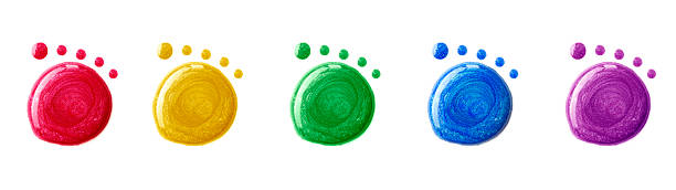 Nail Polish Footprints Rainbow nail polish footprints. yellow nail polish stock pictures, royalty-free photos & images