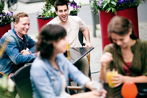 istock Young people having fun in outdoors cafe 171316378
