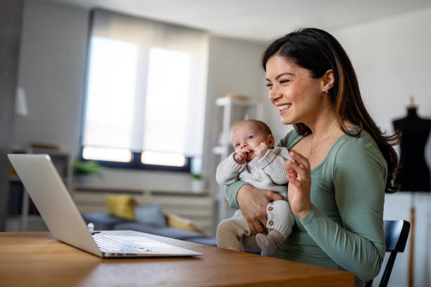 istock Mother with baby having video call online, conversation with relatives, communicating with friends 1713165331