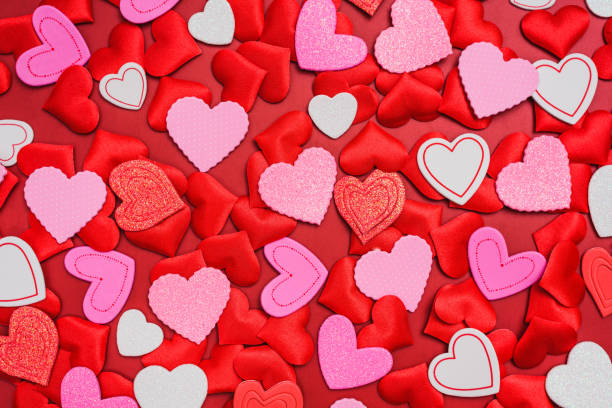 istock Background of many romantic red hearts for Valentine's day. 1713165917