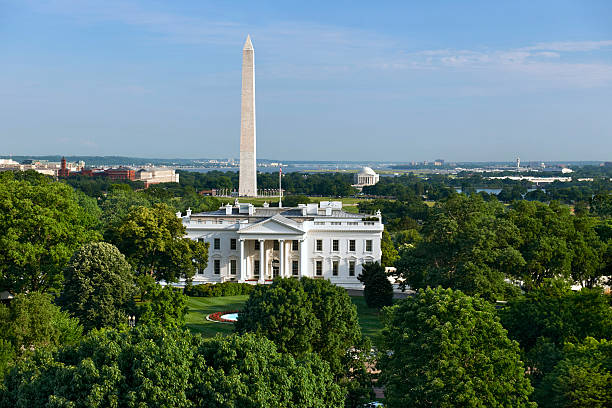 White House, Washington DC Higher angle view of the White House in Washington DC with the Washington and Jefferson Monuments and the Smithsonian Museum in the background. See other DC images in my Washington DC Lightbox. smithsonian museums stock pictures, royalty-free photos & images