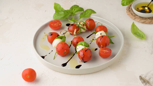 istock Caprese salad with tomato and mozzarella 1713173295