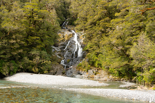 Water cascading down Fantail Falls in the Mt Aspiring National Park, on New Zealand's South Island.