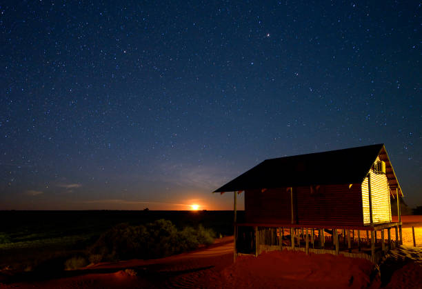 istock Moonrise behind a Bungalow in the Kalahari 171317854