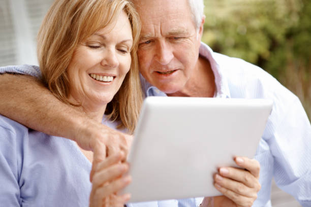 istock Keeping in touch with the world through their tablet 171318252