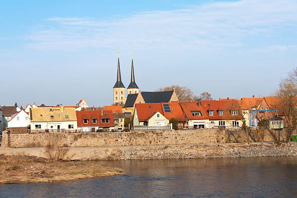 View to the town Grimma, Germany "View to the town Grimma, Germany in the morning light in early springtime. Grimma is a small town in Saxony, situated on the river Mulde. Grimma is a famous Renaissance town with gothic buildings too." grimma stock pictures, royalty-free photos & images