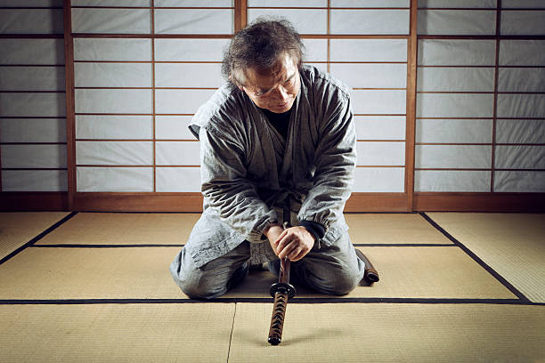 Harakiri, Old japanese man trying to kill himself Old japanese man trying to kill himself. harakiri photos stock pictures, royalty-free photos & images