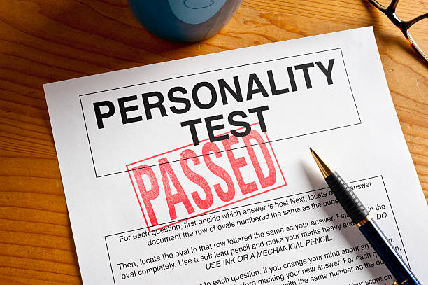 Passed Personality Test PASSED ruber stamped on a Personality Test.  All artwork created by the photographer. personality test stock pictures, royalty-free photos & images