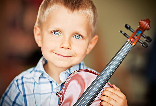 istock Little boy and a violin 171319776