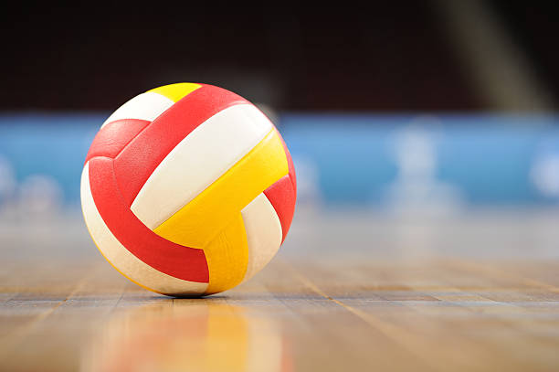 istock A volleyball on a wooden gym floor 171319933