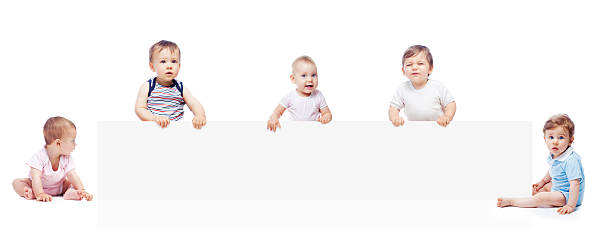 赤ちゃんのバナー - baby holding babies only sign ストックフォトと画像