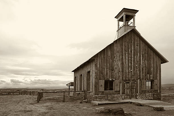istock Sepia Black and White Old West Schoolhouse Building 171320103