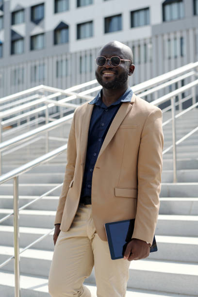 istock Young successful African American solopreneur in quiet luxury attire 1713201063
