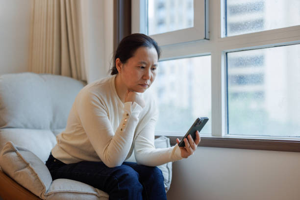 istock Middle aged asian women facing financial fraud 1713201638