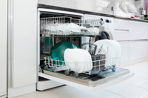 dishwasher open dishwasher with clean dishessimilar images: washing machine photos stock pictures, royalty-free photos & images