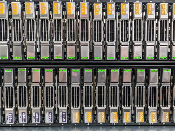 a raid storage array containing a variety of disk sizes - raid array imagens e fotografias de stock