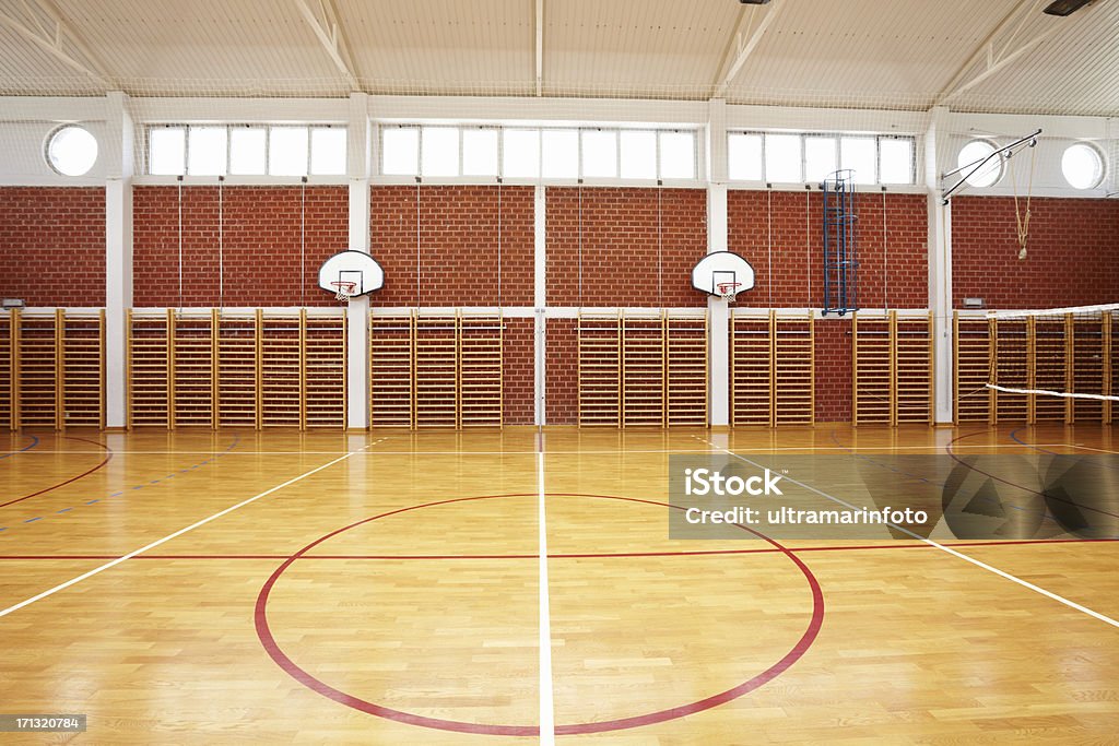 School gymnasium "Brand new school gymnasium, with basketball backboards" School Gymnasium Stock Photo