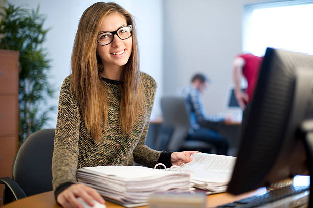 young female office worker young woman working in an office first job photos stock pictures, royalty-free photos & images