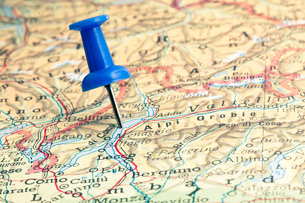 Pushpin pointing on city map, selective focus.
