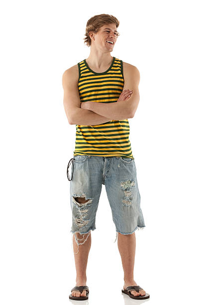 istock Attractive happy young man standing with his arms crossed 171321184