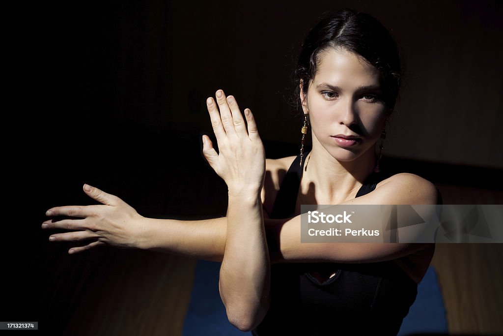 young woman training yoga young woman training yoga - inside shoot Active Lifestyle Stock Photo