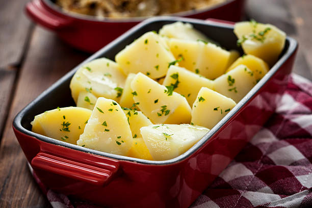 Boiled Potatoes Boiled potatoes with parsley boiled potatoes stock pictures, royalty-free photos & images