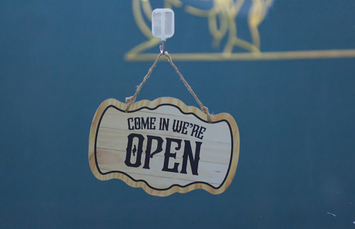 Image of Open sign at a small store