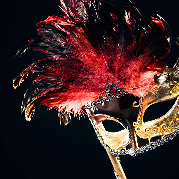 istock Gold and red Masquerade Mask with hand 171322720