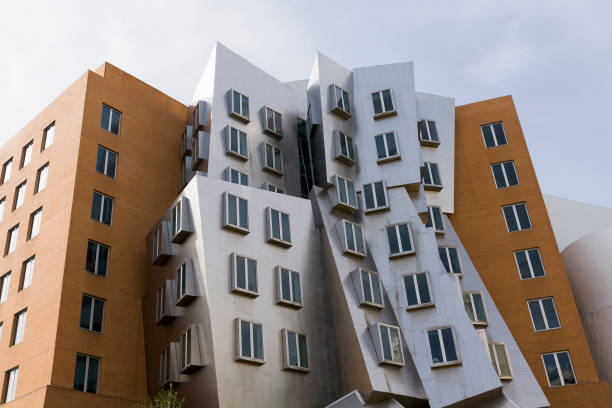 Stata Center building at Massachusetts Institude of Technology "Cambridge, Massachusetts, USA - August 19, 2012: Ray and Maria Stata Center or Building 32 on Massachusetts Institute of Technology campus. Designed by architect Frank Gehry." frank gehry building stock pictures, royalty-free photos & images