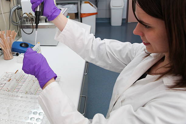 istock Cute technician at work in laboratory of a blood bank 171323199